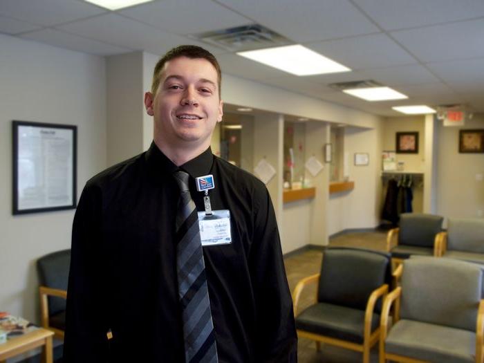 young man at medical office lobby