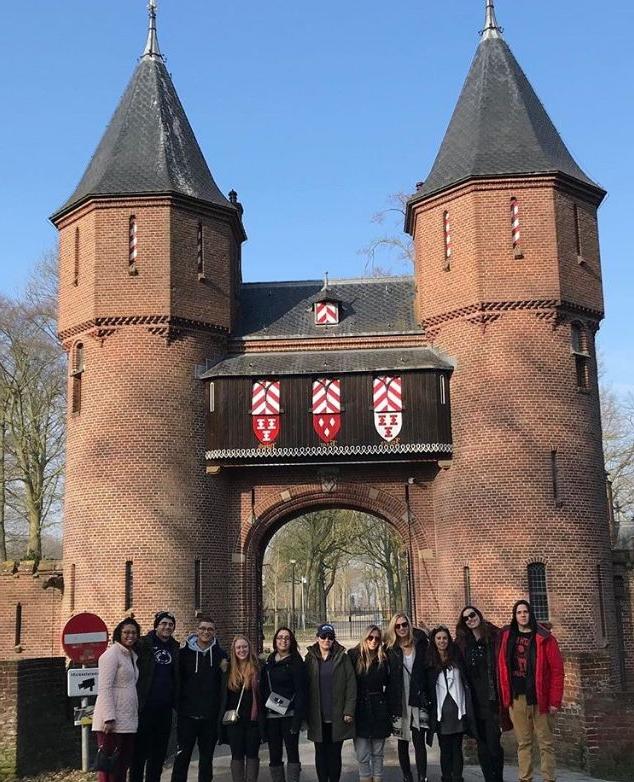 Group of students in front of castle in Amsterdam