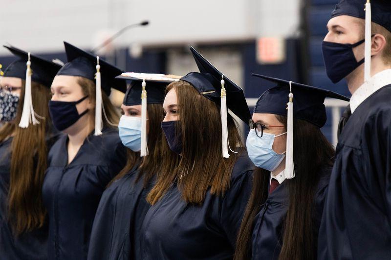 Graduates pose for photo