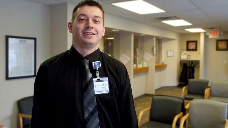 young man at medical office lobby