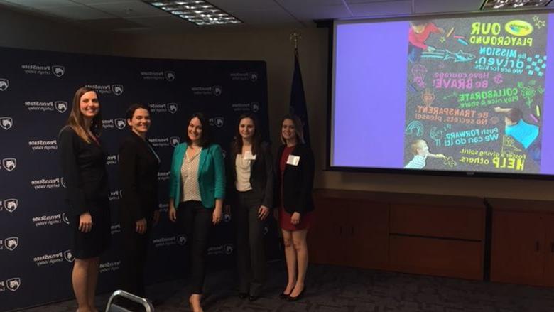 Event committee posed with Keynote speaker