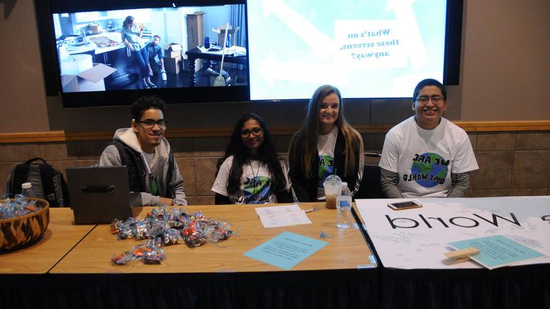 Students staffing a table